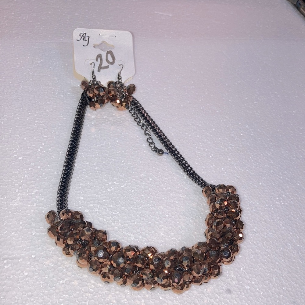 Fashion necklace and matching earring set.